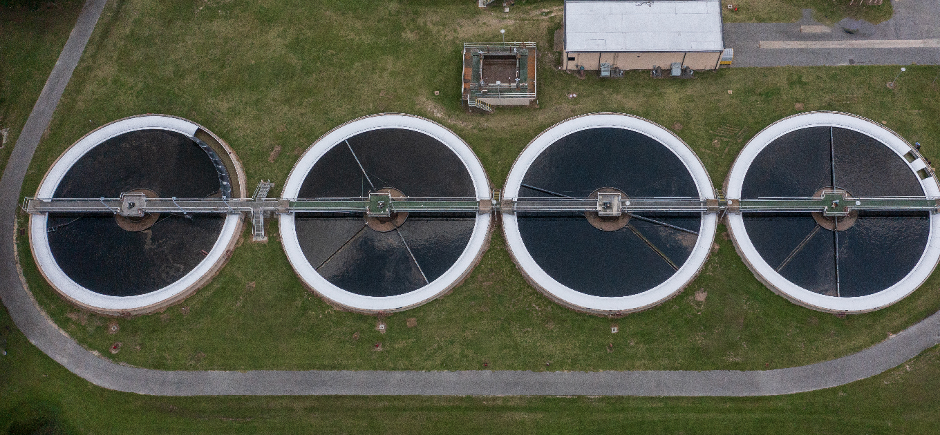 an aewrial view of 4 clarifier tanks and cpvers by NEFCO at a water treatment plant in FL